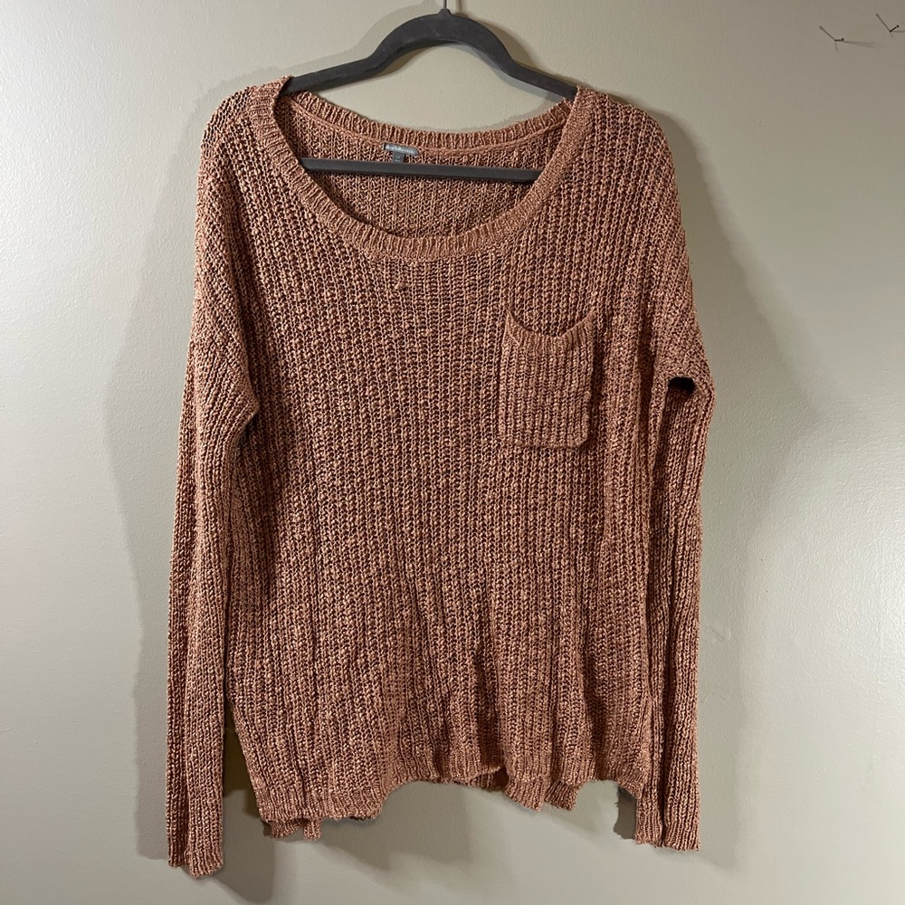 Charlotte Russe sweater with front pocket. Great condition